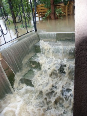 Water gushing into a house Water damage
